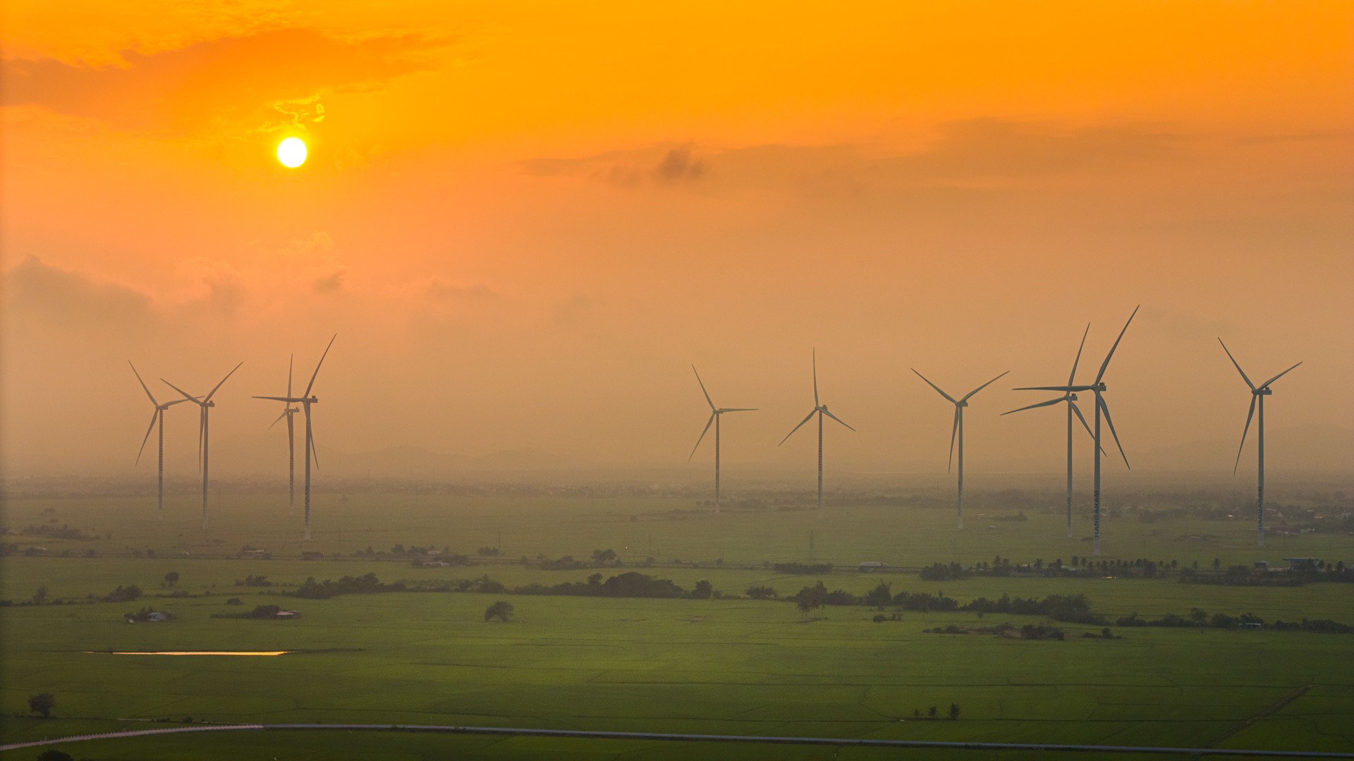 view of turbine green energy electricity, windmill for electric power production, Wind turbines generating electricity on rice field at Phan Rang, Ninh Thuan province, Vietnam